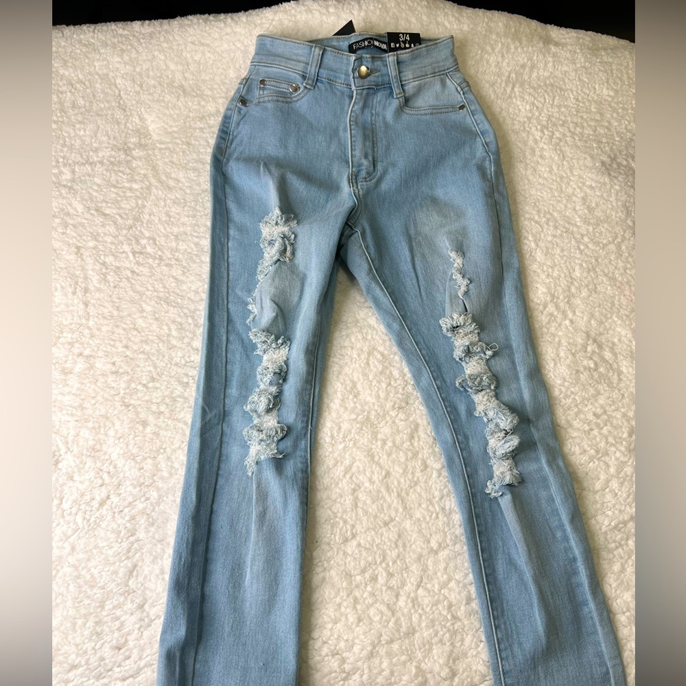 Fashion Nova straight leg, ripped light washed jeans